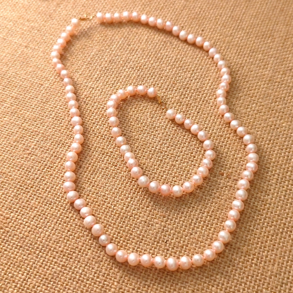 Pink pearl necklace and matching bracelet
